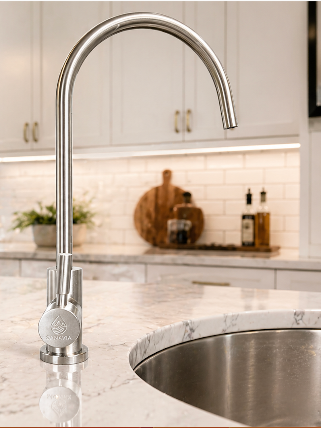 Sanavia reverse osmosis faucet installed on a marble kitchen countertop